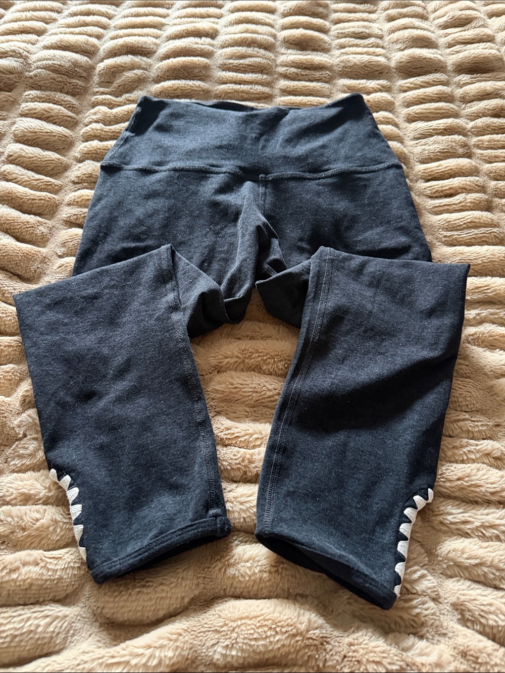 Beyond Yoga Black Cropped Leggings with White Triangle Accent
